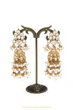 Gold Finished Pearl Kundan Jhumki Earrings by PTJ
