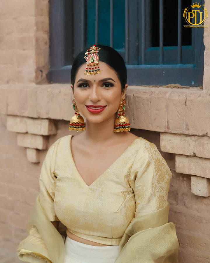 Gold Finished Rubby Emerald Kundan Jhumki Pippal Patti Morni Earrings Tikka Set | Rawayat by Punjabi Traditional Jewellery