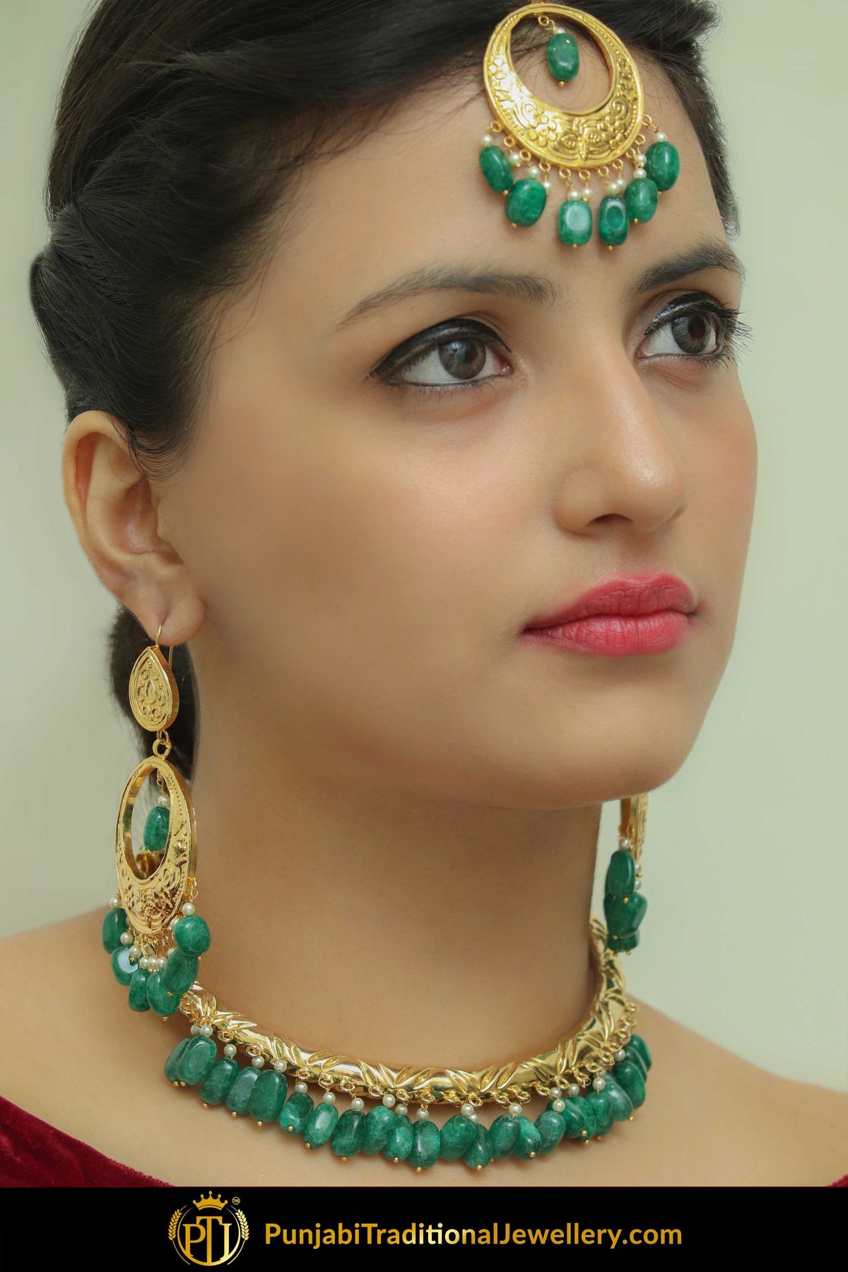 Hayat Gold Finished Emerald Hasli Necklace, Tikka & Earrings | Punjabi Traditional Jewellery Exclusive