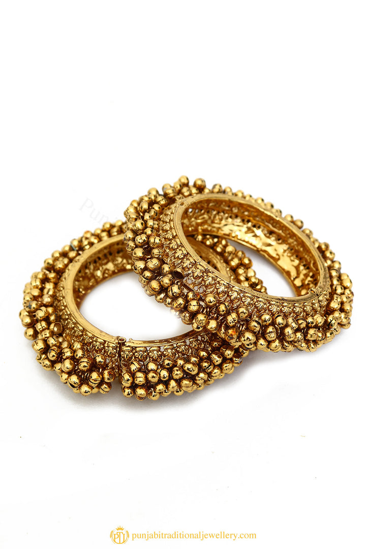 Gold Finished Bangles by PTJ