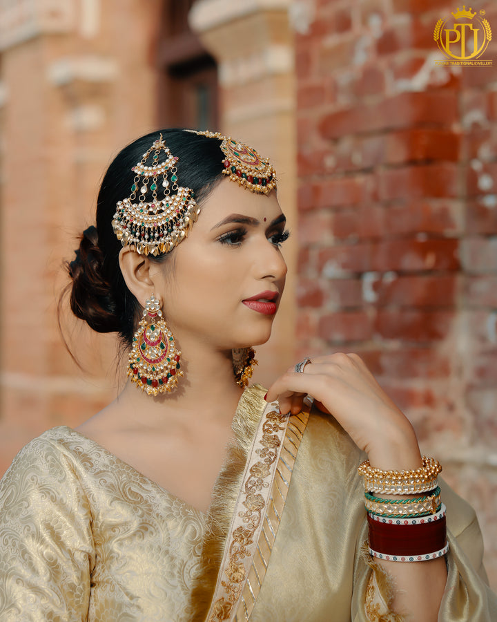 Gold Finished Rubby Emerald Pippal Patti Kundan Earring Tikka Set With Passa | Rawayat by Punjabi Traditional Jewellery